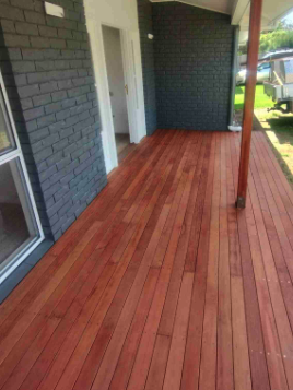 Stained porch decking against German Village brick